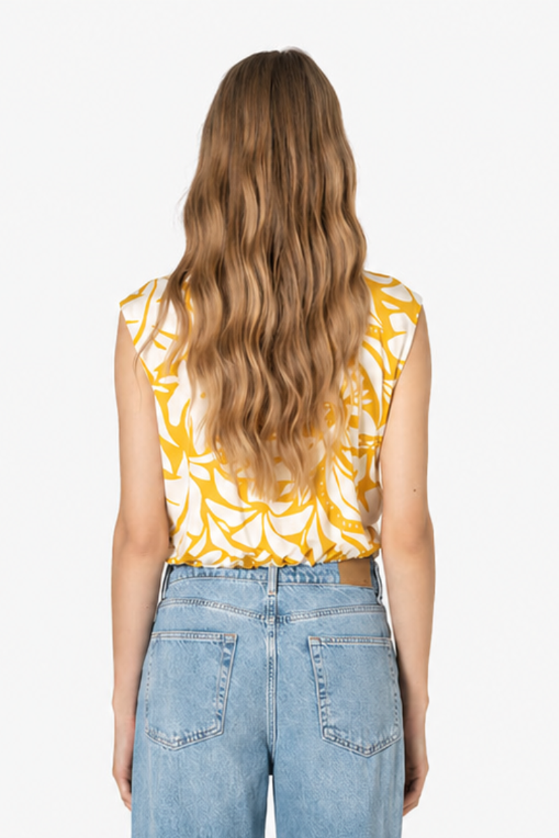 Blusa Rüga com padrão floral amarelo